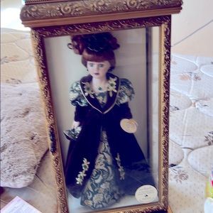 Collection doll in an antique box